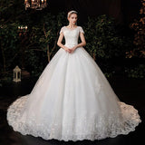 Luxury Lace V Neck Ball Gown Wedding Dresses Short Sleeve Princess Illusion Applique Bridal Gowns